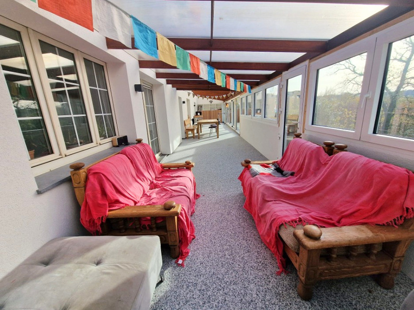 The sunny veranda with sofas